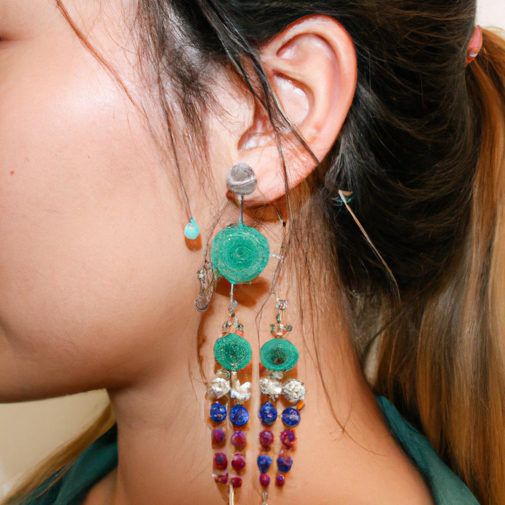 Woman wearing various types of earrings