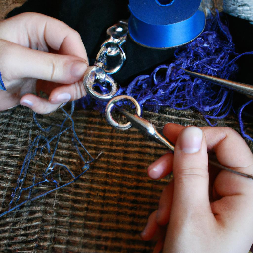 Person weaving chainmaille jewelry