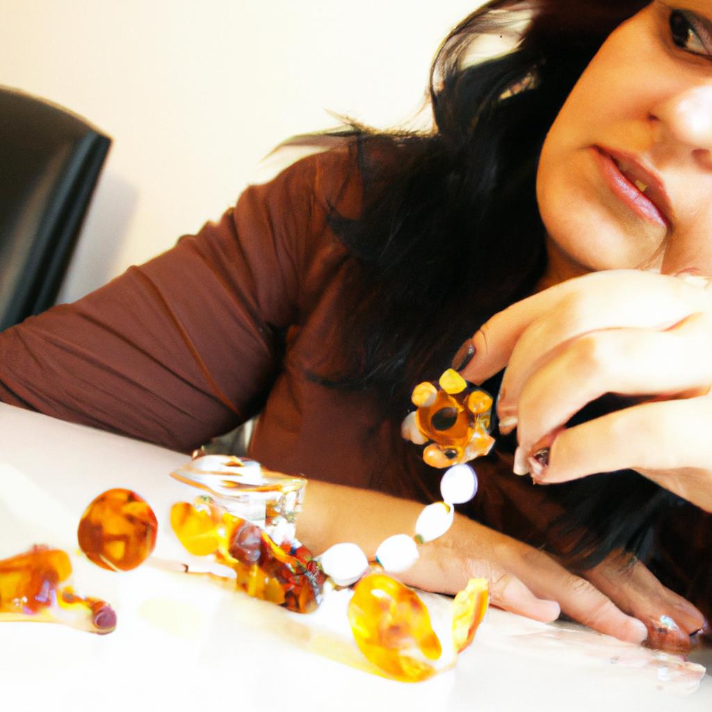 Woman examining citrine gemstone jewelry