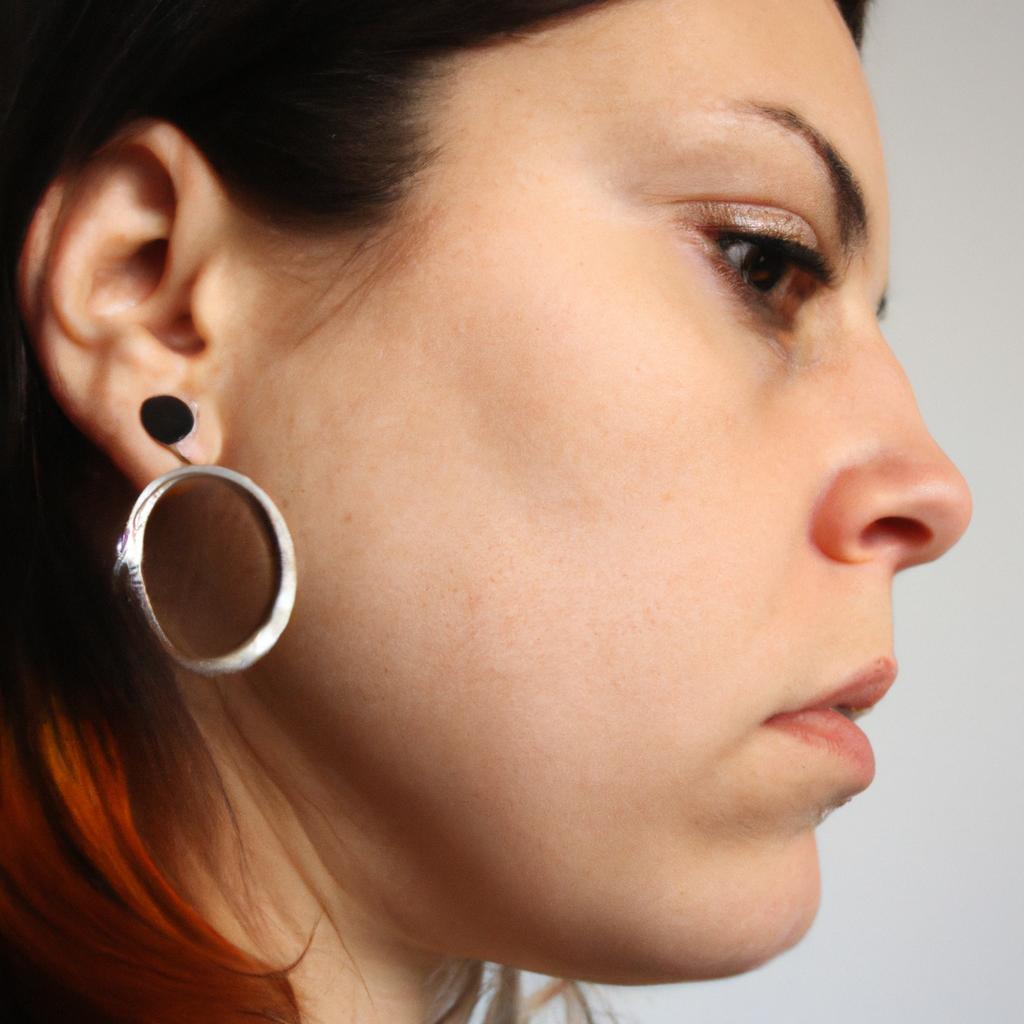 Woman wearing hoop earrings confidently