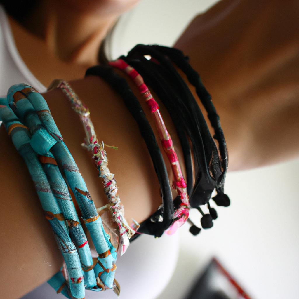Woman wearing multiple stacked bracelets