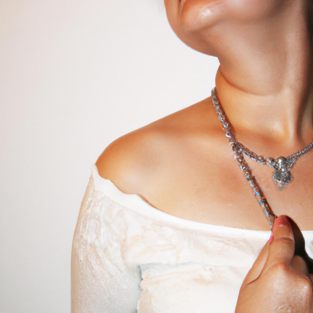 Woman wearing pearl jewelry, posing