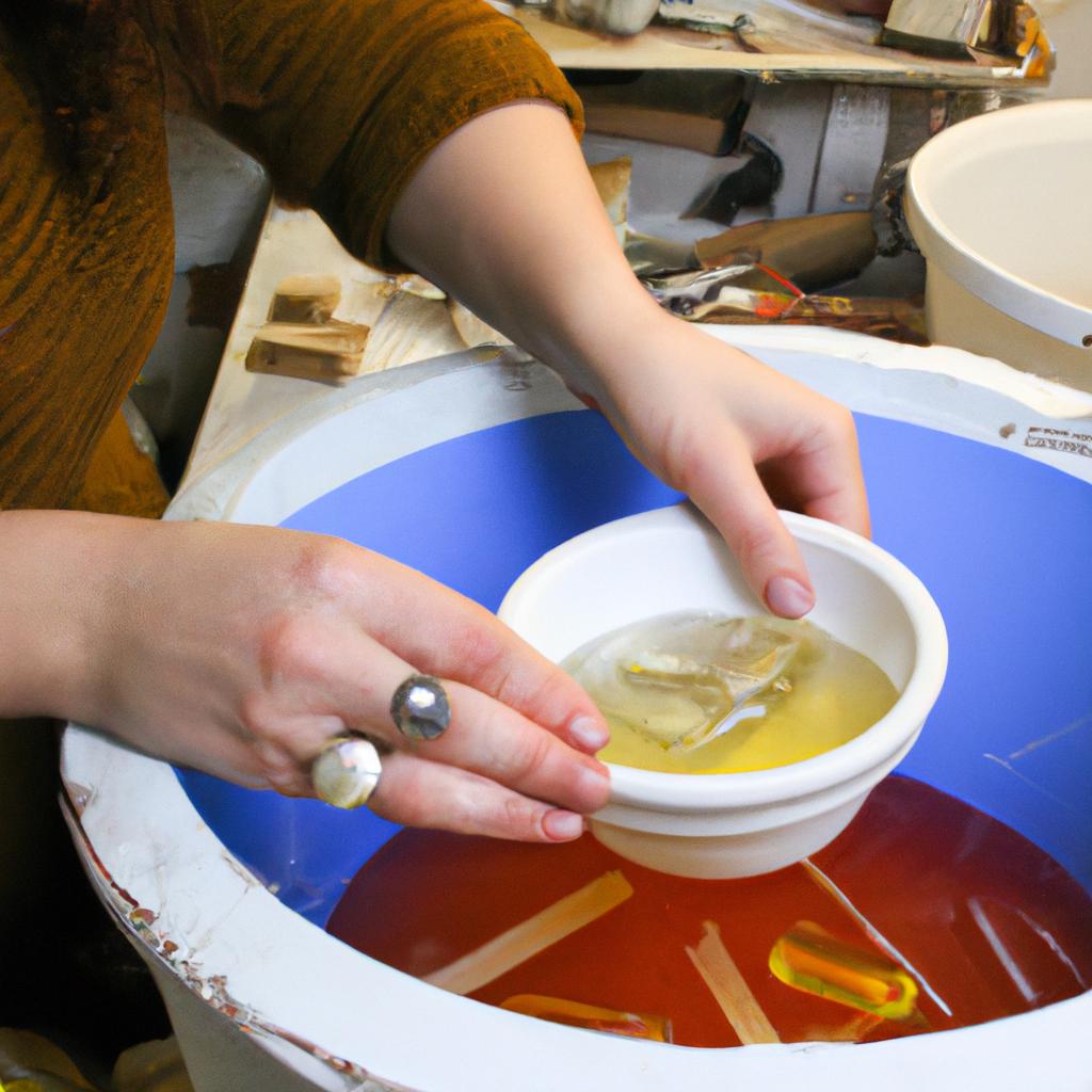 Woman pouring resin into mold